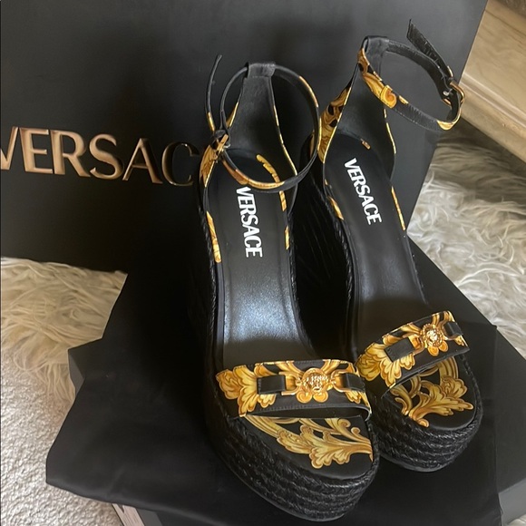 Versace Women's Black and Gold Sandals